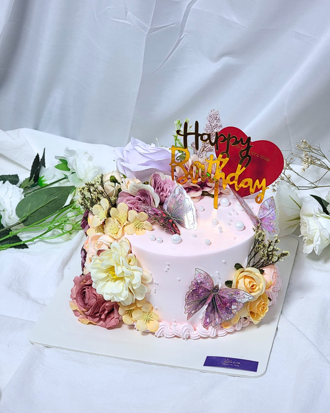 Purple & Pink Floral Cake Design