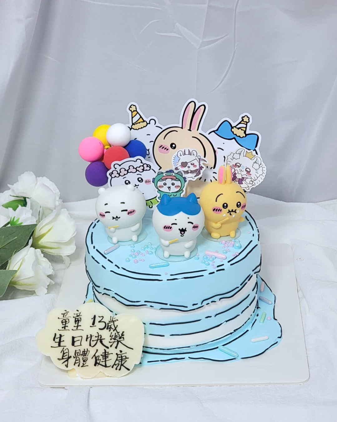 2D Comic Style Chiikawa Figure Cake Blue Theme Design